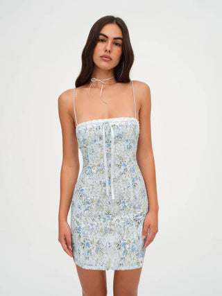 Woman in the For Love and Lemons Claire Dress
