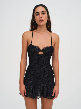 Woman in the For Love and Lemons Bette Mini Lace Dress