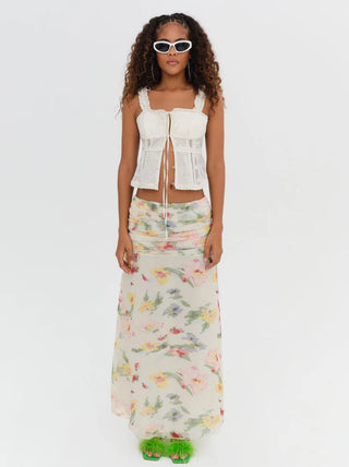 Woman in the For Love and Lemons Abby Maxi Skirt