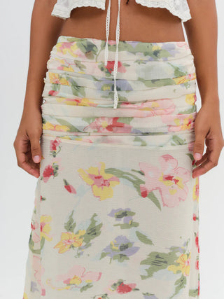 Woman in the For Love and Lemons Abby Maxi Skirt