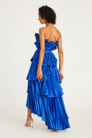 Woman wearing blue Amur Judah Pleated Gown