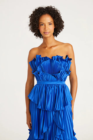 Woman wearing blue Amur Judah Pleated Gown