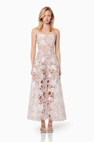 Woman in the Elliatt Connection Maxi Gown in Multi