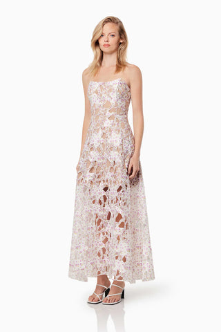 Woman in the Elliatt Connection Maxi Gown in Multi
