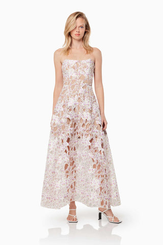 Woman in the Elliatt Connection Maxi Gown in Multi