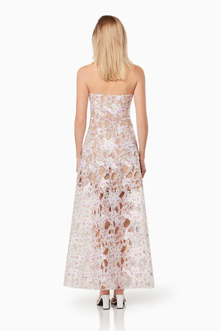Woman in the Elliatt Connection Maxi Gown in Multi