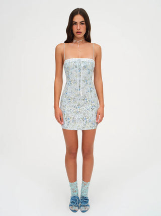 Woman in the For Love and Lemons Claire Dress