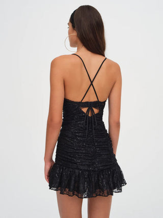 Woman in the For Love and Lemons Bette Mini Lace Dress