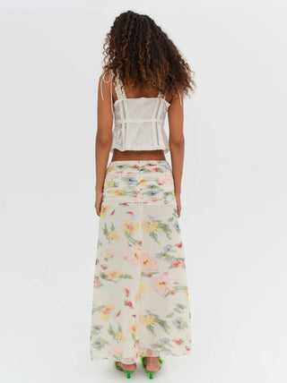 Woman in the For Love and Lemons Abby Maxi Skirt