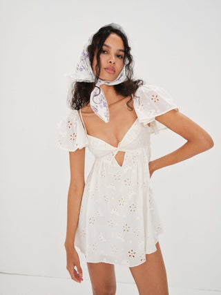 Woman in the For Love and Lemons Weston Mini Dress