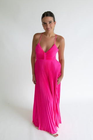 Woman in pink A.L.C maxi dress