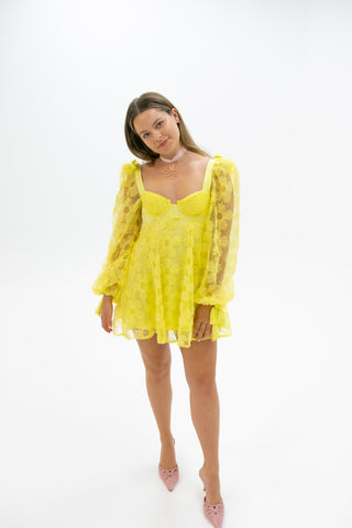 Woman in the For Love and Lemons Kiersten Mini Dress