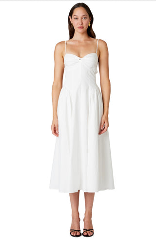 Woman in the NIA Destene Dress in White