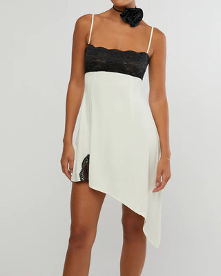 Woman in the WeWoreWhat Lace Asymmetrical Slip Dress